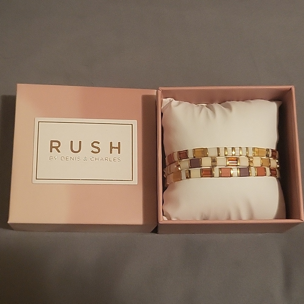 Rush by Denis and Charles David peck bracelet set